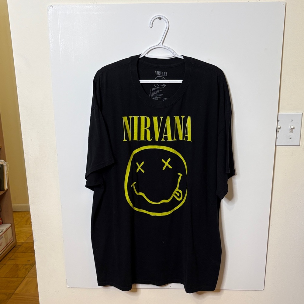 NIRVANA Black Tee with Yellow Smiley Design